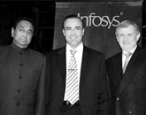Infosys Australia CEO Gary Ebeyan (center) flanked by Mr. Kamal Nath, Minister for Commerce, Government of India (to his right) and Mr. Simon Crean, Minister of Trade - Australia.