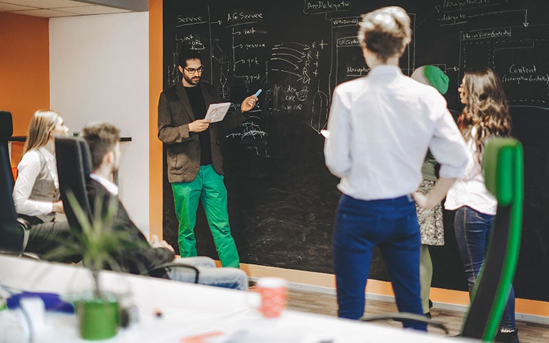 Hybrid Scaling of Agile: A New Way of Working