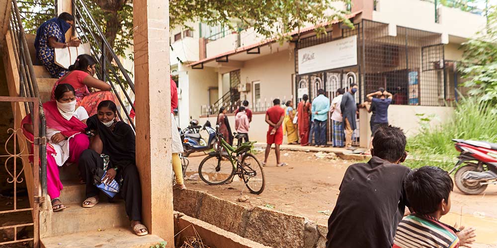 Image: Shoppers waiting outside Imagine Clothes Bank