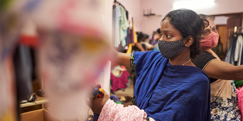 Image: Shopper at Imagine Clothes Bank