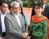 Infosys Executive Co-Chairman S Gopalakrishnan welcomes H. E. Daw Aung San Suu Kyi.